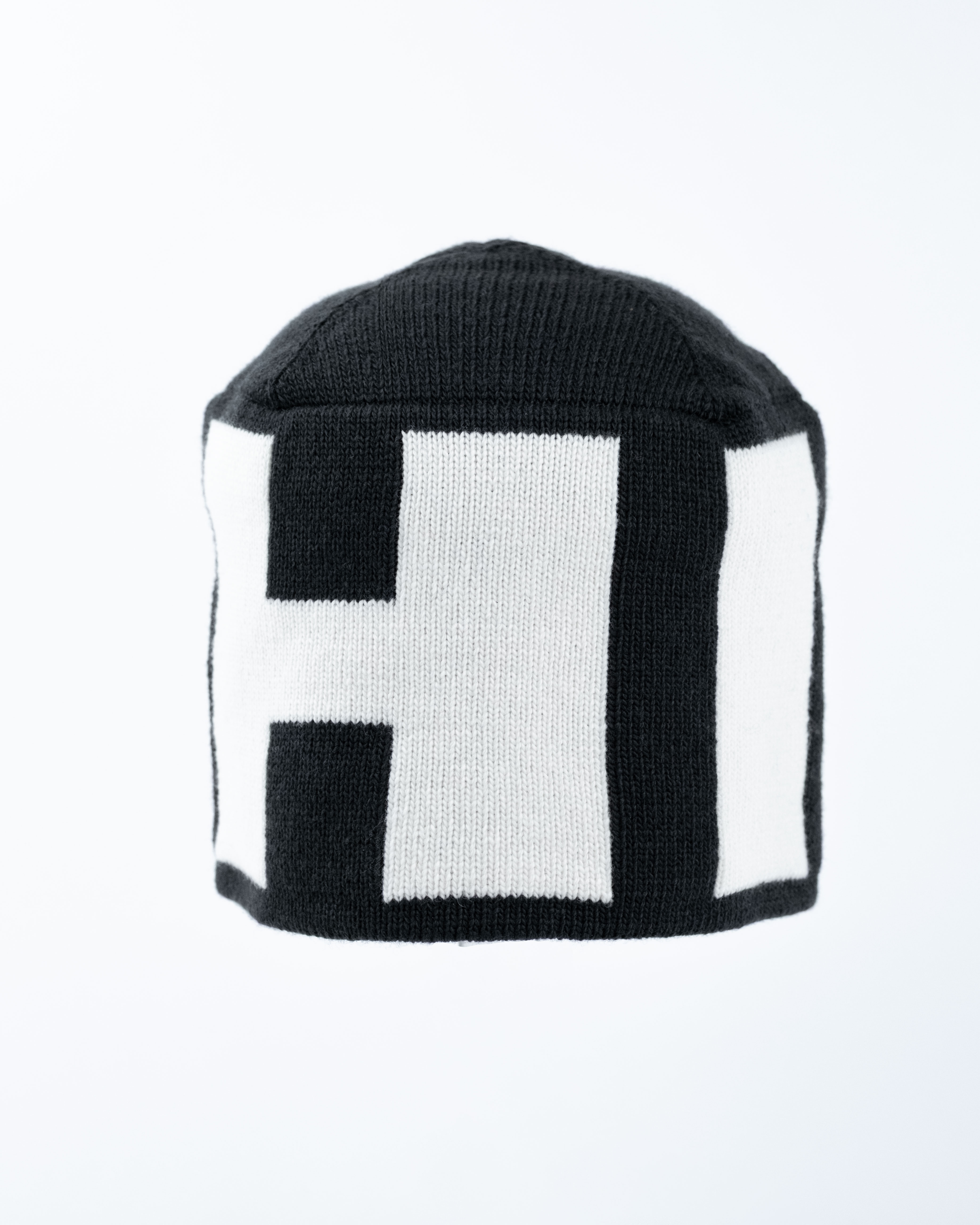 HI – Enganliegende Strickmütze aus italienischer Merinowolle