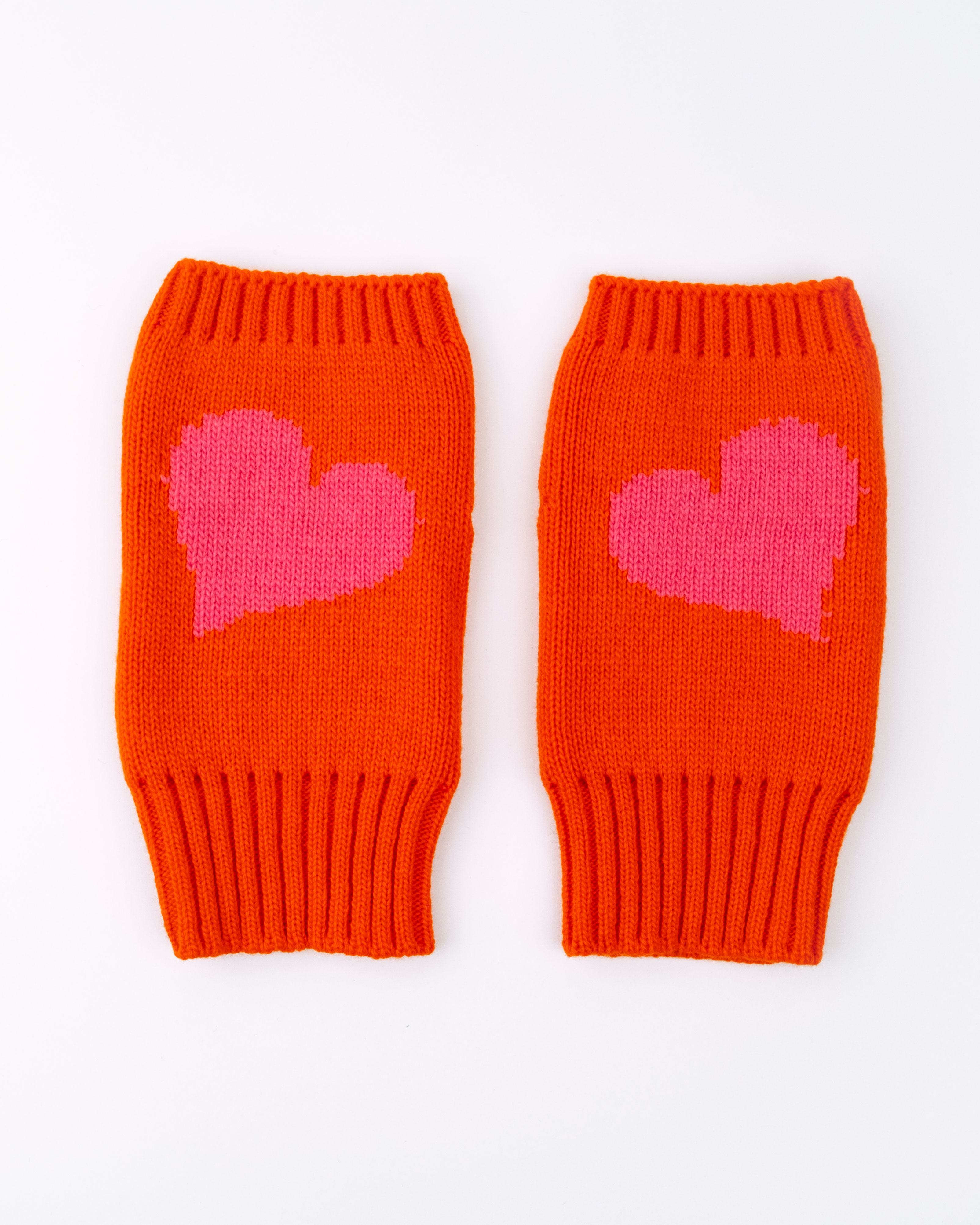 Heartwarmer – Pulswärmer aus Merinowolle in Orange & Pink