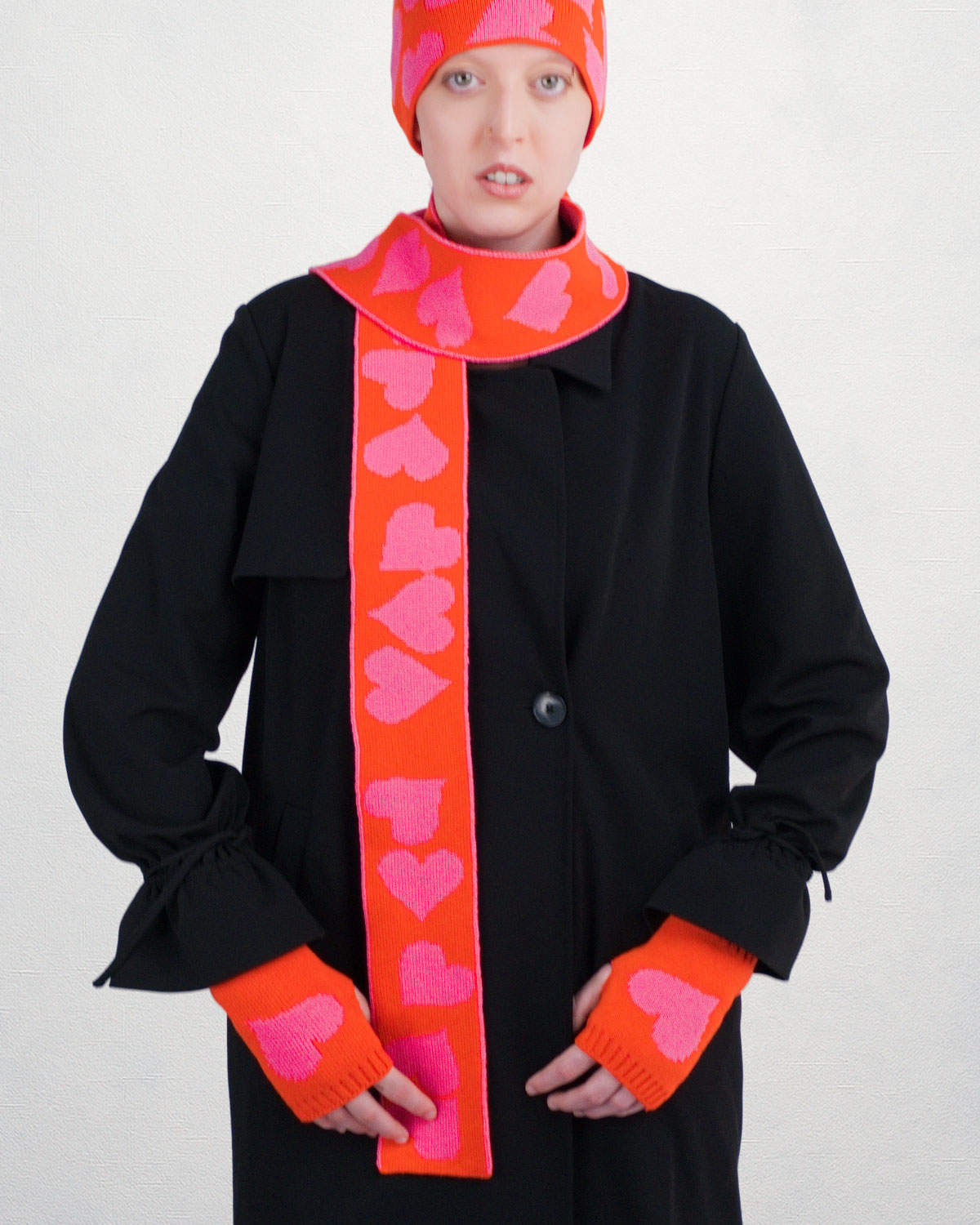 Heartloop – Jacquard-Schal aus Merinowolle in Orange & Pink