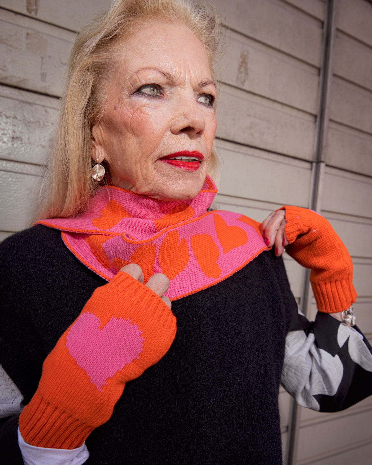 Deux Cœurs – Pulswärmer aus Merinowolle in Orange & Pink