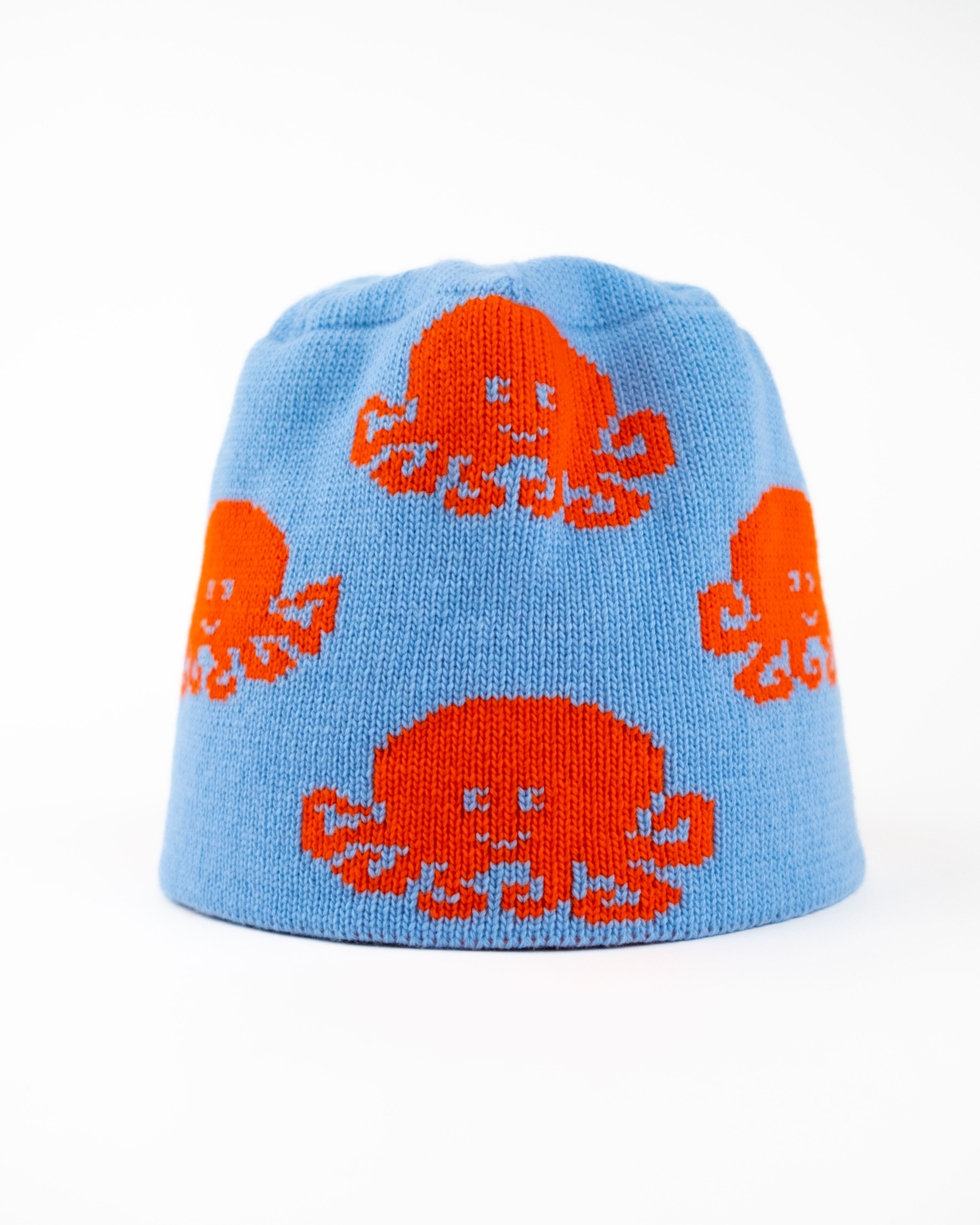 NATURAL – Skull Cap aus Merinowolle in Hellblau & Orange